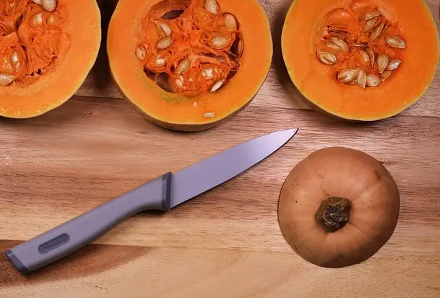 butternut squash with knife
