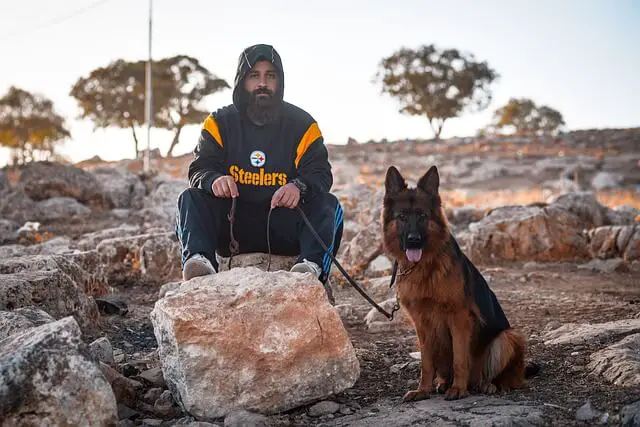 owner with his german shepherd